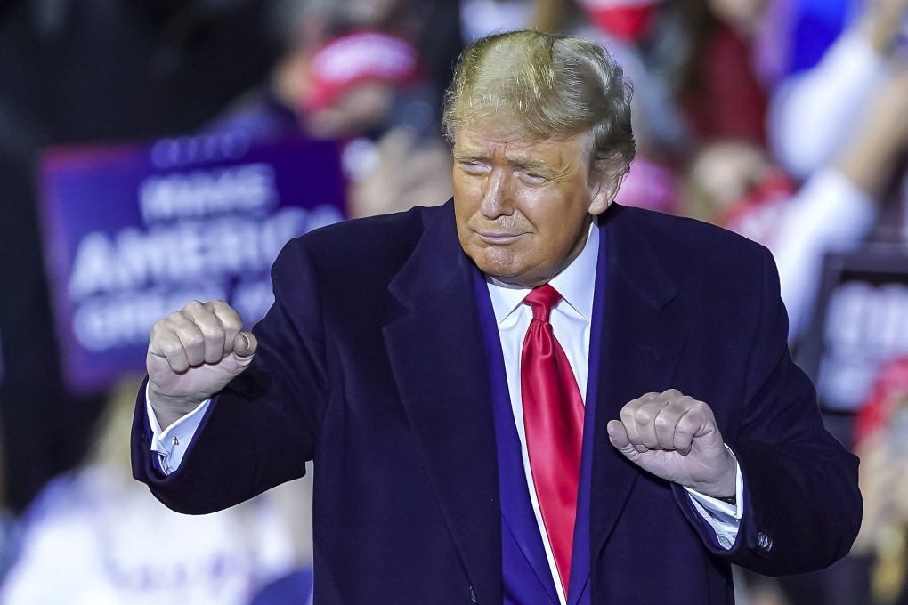 US President Donald Trump gestures at the end of a campaign event in Swanton, Ohio, on Monday. Photo: EPA-EFE