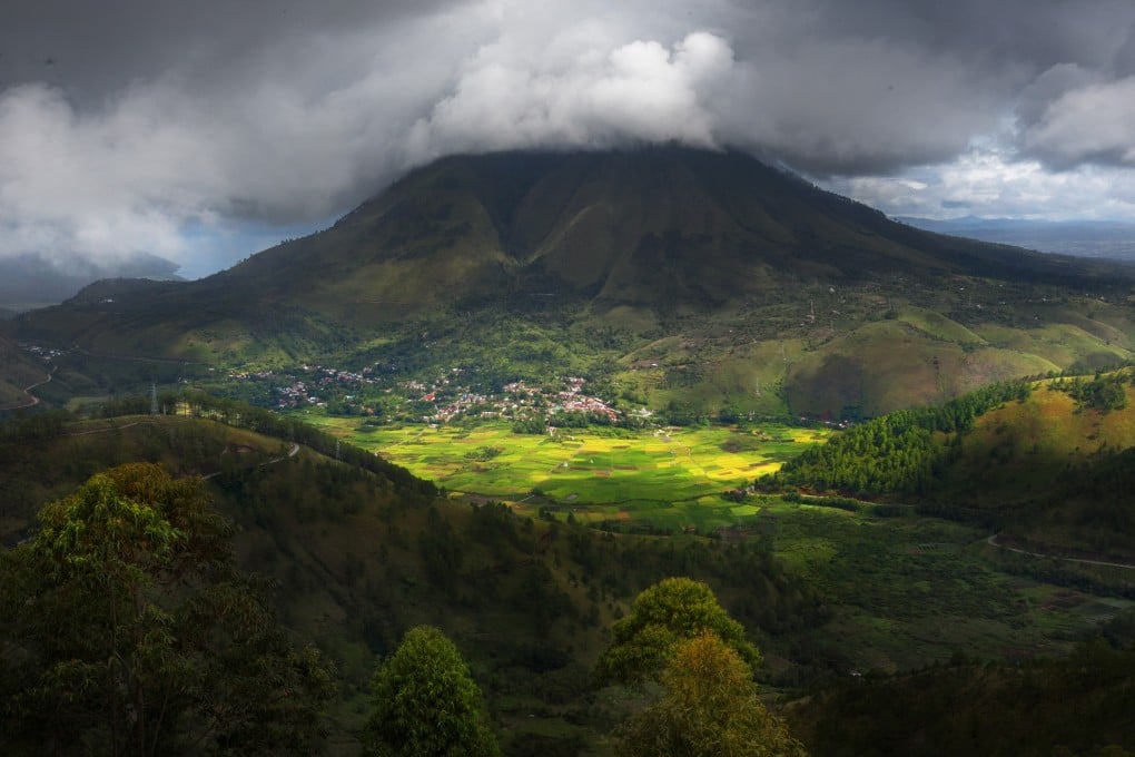 Lake Toba in Sumatra, Indonesia, is in the caldera of the supervolcano that erupted 74,000 years ago. Photo: Shutterstock Images
