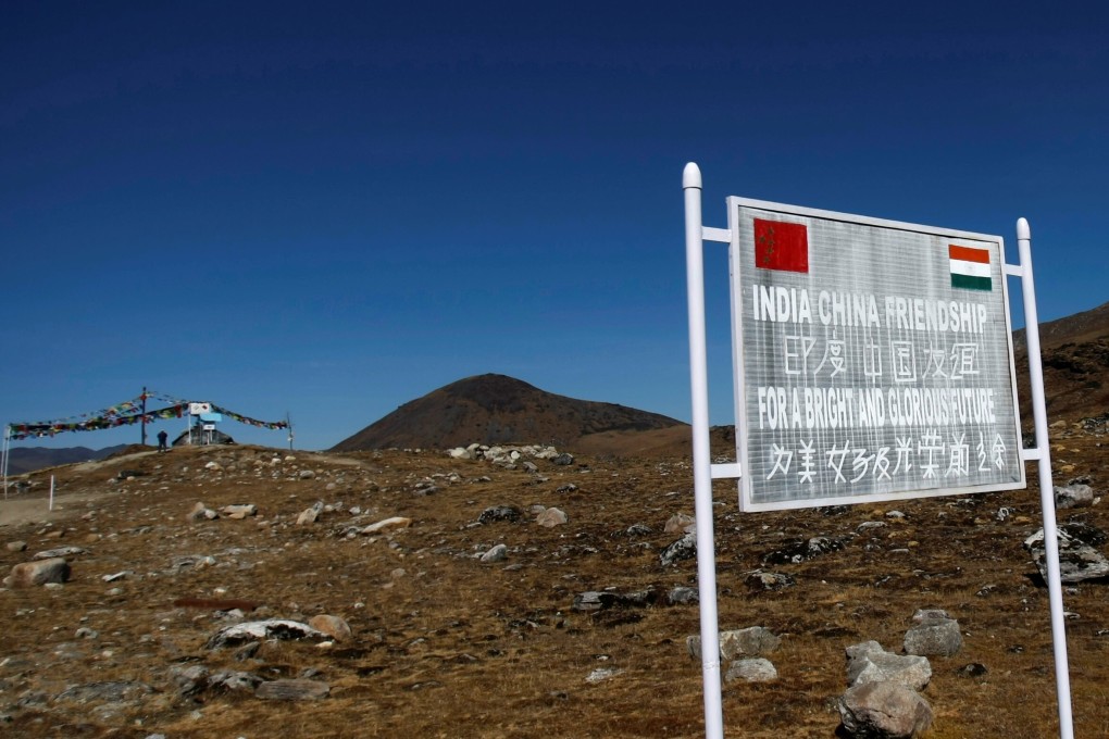 A signboard seen from the Indian side of the India-China border at Bumla in the northeastern Indian state of Arunachal Pradesh on November 11, 2009. The once-cordial relations between India and China appear set to deteriorate further with India’s use of the Tibet card and China’s steadfast refusal to see India as an equal. Photo: Reuters