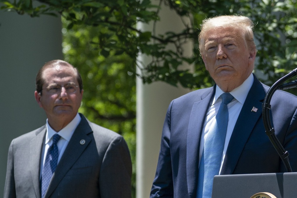 Health and Human Secretary Alex Azar and US President Donald Trump. Photo: Getty Images/TNS