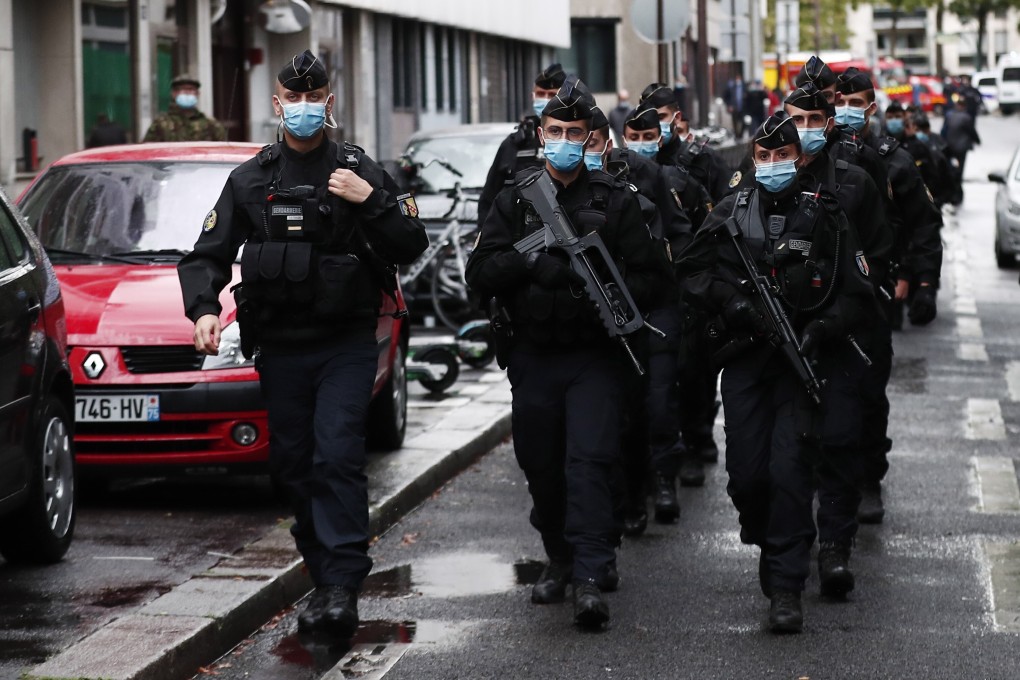 French police officers are deployed near the former Charlie Hebdo offices in Paris. Photo: EPA-EFE