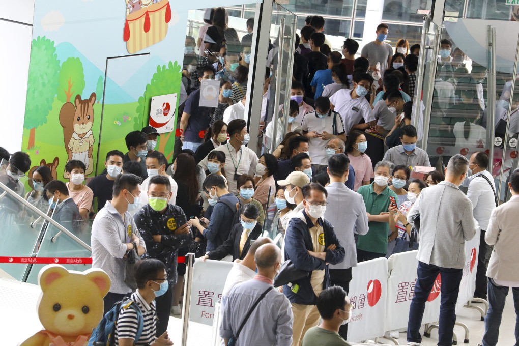 Homebuyers lining up for CK Asset's Sea To Sky development at the developer’s sales office at the Fortune Metropolis on 26 September 2020. Photo: Dickson Lee