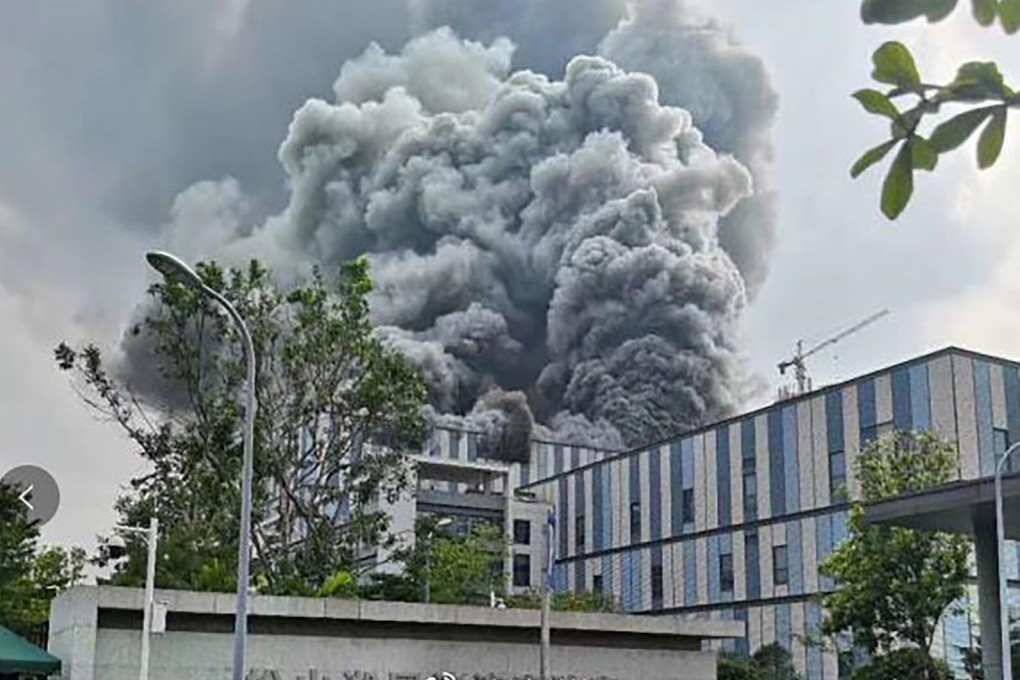 Thick plumes of smoke are seen coming out of a building at a Huawei Technologies complex in the city of Dongguan, in southern Guangdong province, that caught fire on Friday afternoon. Photo: Weibo