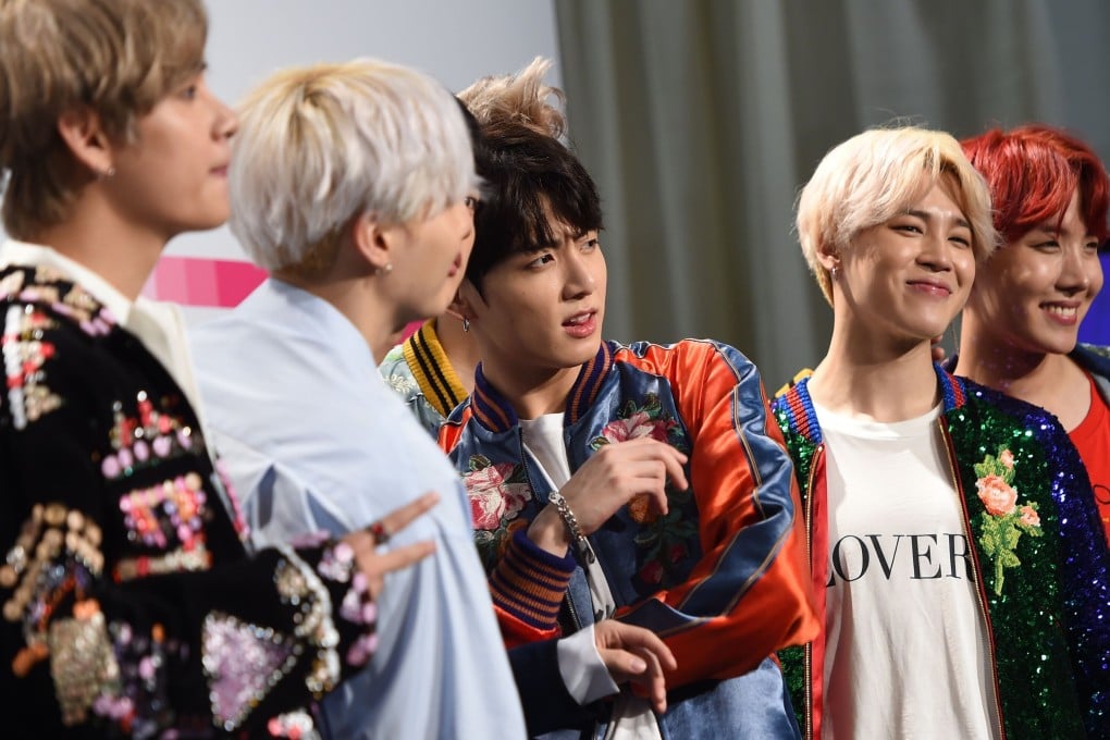The IPO of Big Hit Entertainment will make multimilionaires of the seven BTS members, who were given shares ahead of the label’s listing, and fans of the K-pop band want a piece of the action too –not to get rich, but as keepsakes or entry tickets to shareholders’ meetings where the band might be present. Photo: AFP