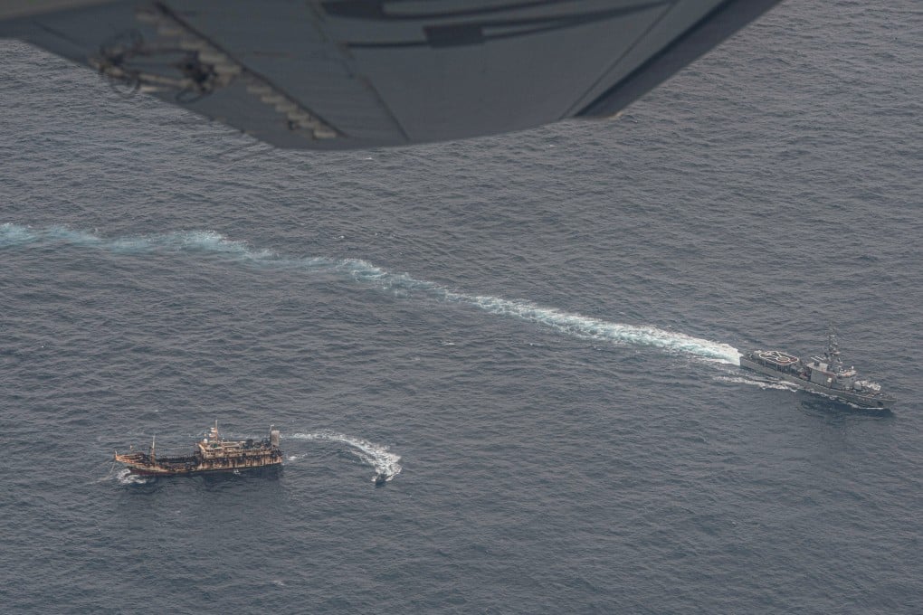 Ecuadorian Navy vessels surround a fishing boat after detecting a fleet of mostly Chinese-flagged ships near the Galapagos Islands in August. Photo: Reuters