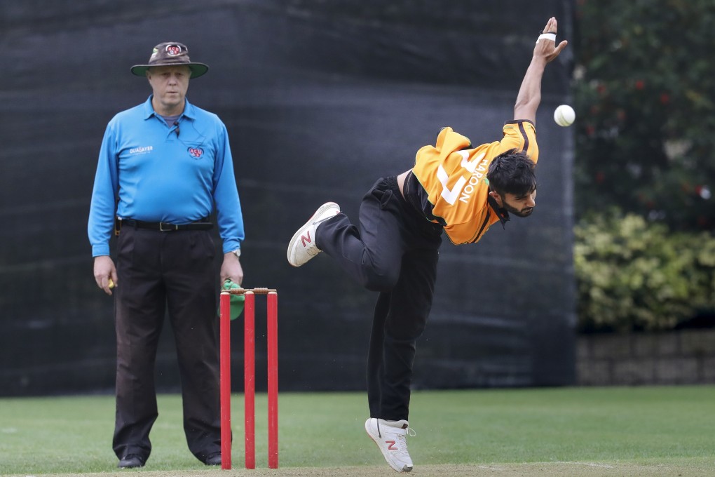 Diasqua Little Sai Wan Cricket Club’s Haroon Arshad bowls against HKCC in a Premier League match. Photo: Edmond So