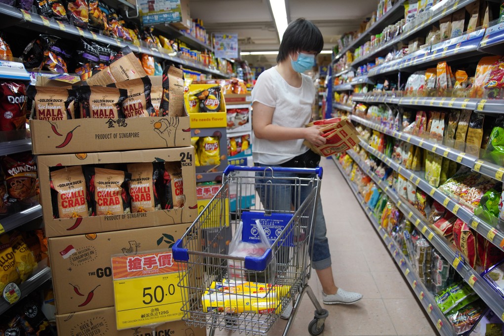 A woman shops at a supermarket in Whampoa on August 19. Photo: Winson Wong
