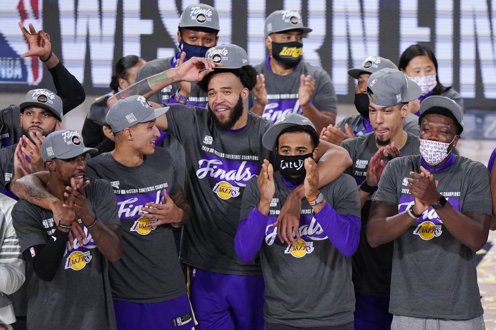 The Los Angeles Lakers celebrate after beating the Denver Nuggets in the NBA Western Conference final. Photo: AP