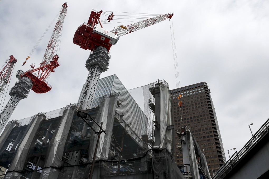 Cranes operate at a construction site in Tokyo on May 13, 2019. Tokyo was the world’s most actively traded real estate investment market in the first six months of this year, ahead of New York and Paris. Photo: Bloomberg