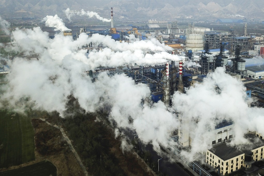 Smoke and steam rise from a coal processing plant in Hejin in central China’s Shanxi province. Chinese President Xi Jinping has said China will aim to stop pumping additional carbon dioxide into the atmosphere by 2060. Photo: AP Photo