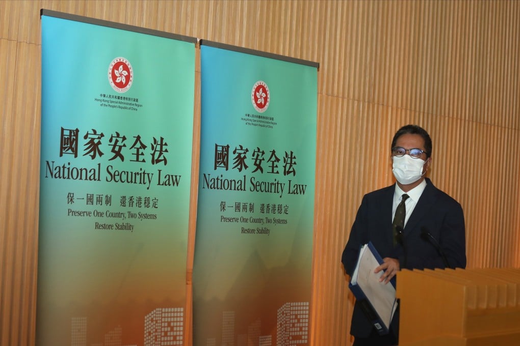 Secretary for Development Michael Wong Wai-lun speaks to the press on a land sale programme in June 2020. Photo: Xiaomei Chen
