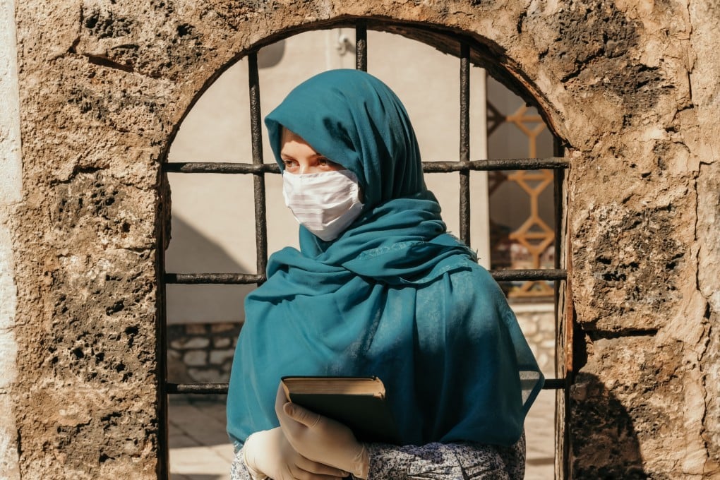 Wearing a mask is mandatory – but not always comfortable when you wear a hijab. Photo: Shutterstock