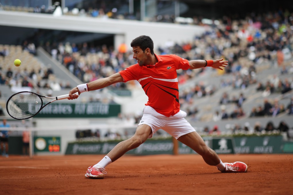 Novak Djokovic plays a shot against Austria’s Dominic Thiem in Rome last week. He has vowed to be on his best behaviour in Paris. Photo: AP