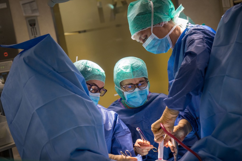Surgeons perform a laparoscopy. The keyhole procedure to remove a uterus has a shorter recovery time and much less scarring than open surgery. Photo: BSIP/Universal Images Group via Getty Images