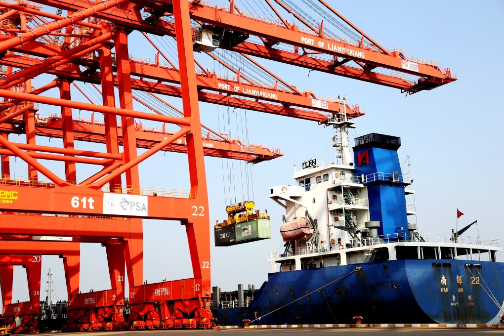 An oceangoing freighter loads containers at a port in Lianyungang, in eastern Jiangsu province, on September 7. While the contribution of exports to China’s growth formula has shrunk over the years, they are still expected to play an important role in the country’s “dual circulation” strategy. Photo: Xinhua