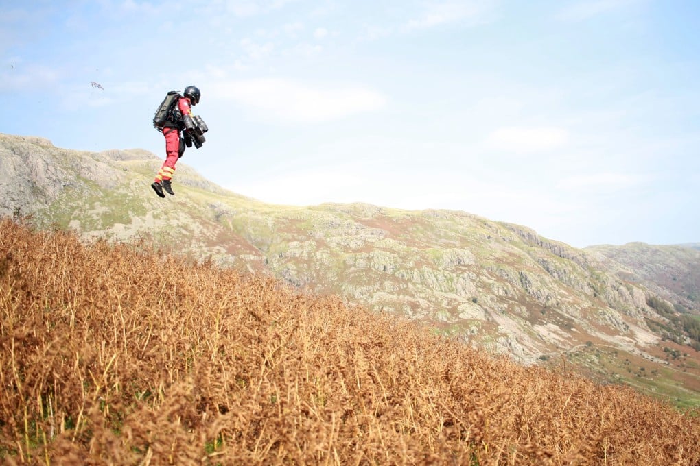Inventor Richard Browning conducts a test flight of his jet-powered suit at Lake District in Britain. Photo: GNASS handout via AFP