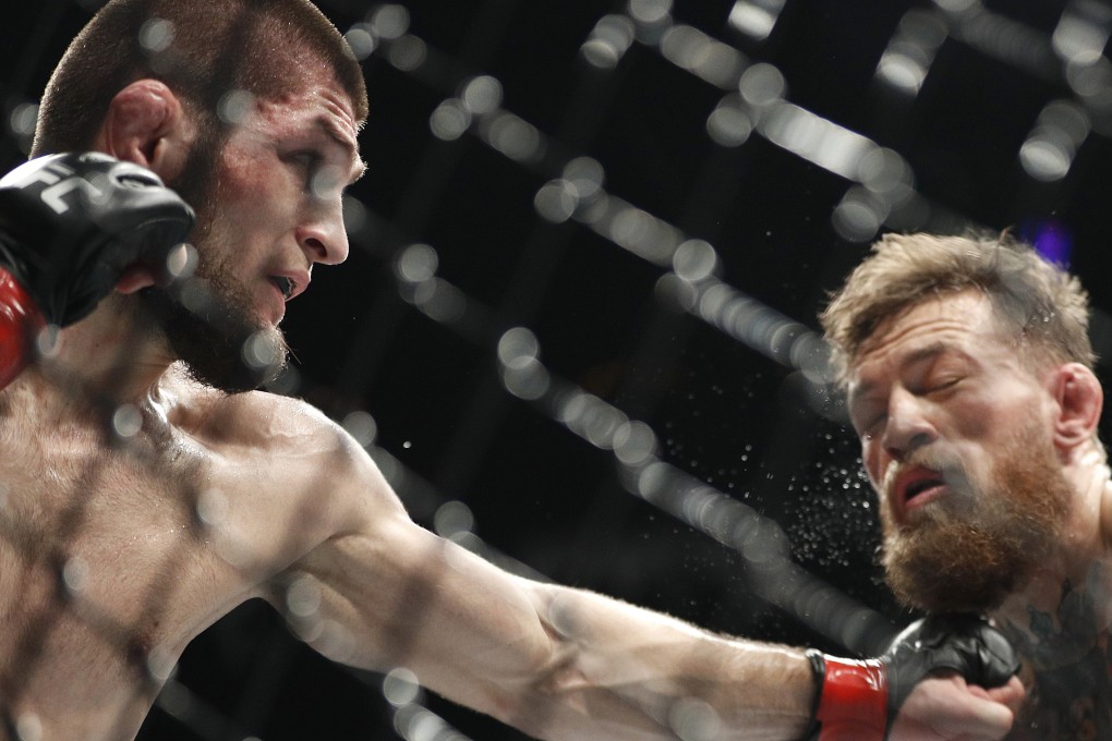 UFC lightweight champion Khabib Nurmagomedov punches Conor McGregor at UFC 229 in Las Vegas in 2018. Photo: AP