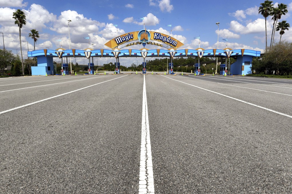 Lanes leading to the entrance of Walt Disney World's Magic Kingdom sit empty on March 24, 2020 during its second week of closure in response to the coronavirus pandemic in Orlando, Florida. Photo: Orlando Sentinel via AP