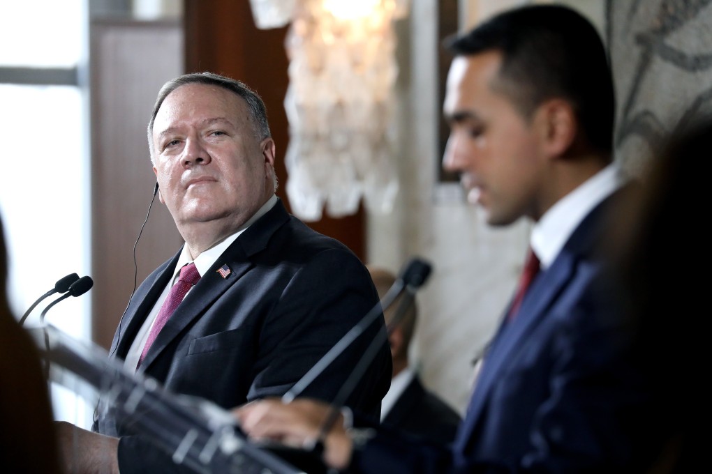 US Secretary of State Mike Pompeo listens as Luigi di Maio, Italy’s foreign minister, speaks at a press conference after their meeting in Rome on Wednesday. Photo: Alessia Pierdomenico/Bloomberg