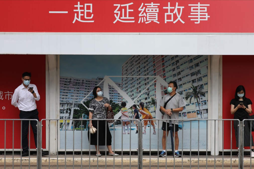 Hongkongers wait for a tram in front of a HSBC advertisement in Central on September 28. Photo: Nora Tam