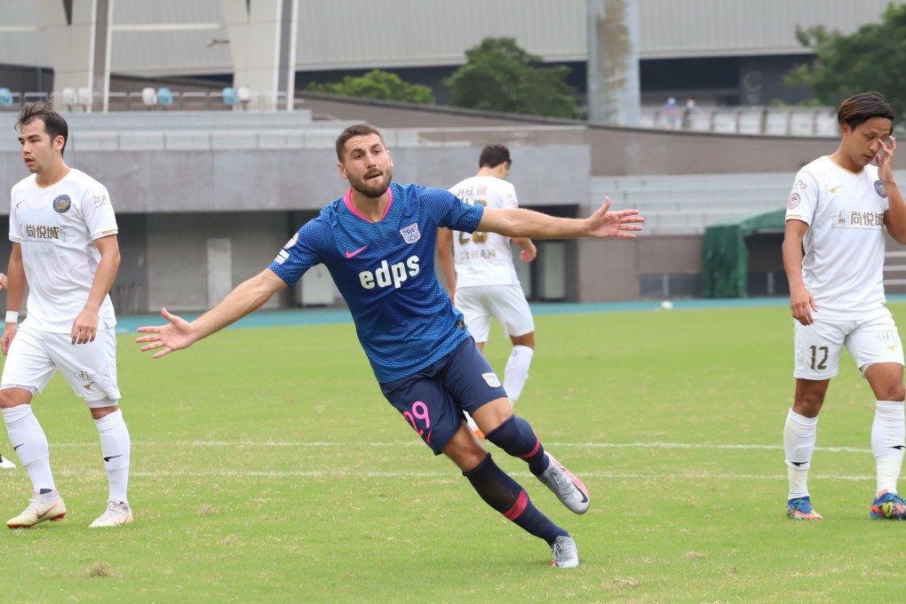 Gavilan Manu celebrates after scoring a penalty for Kitchee. Photos: Chan Kin-wa