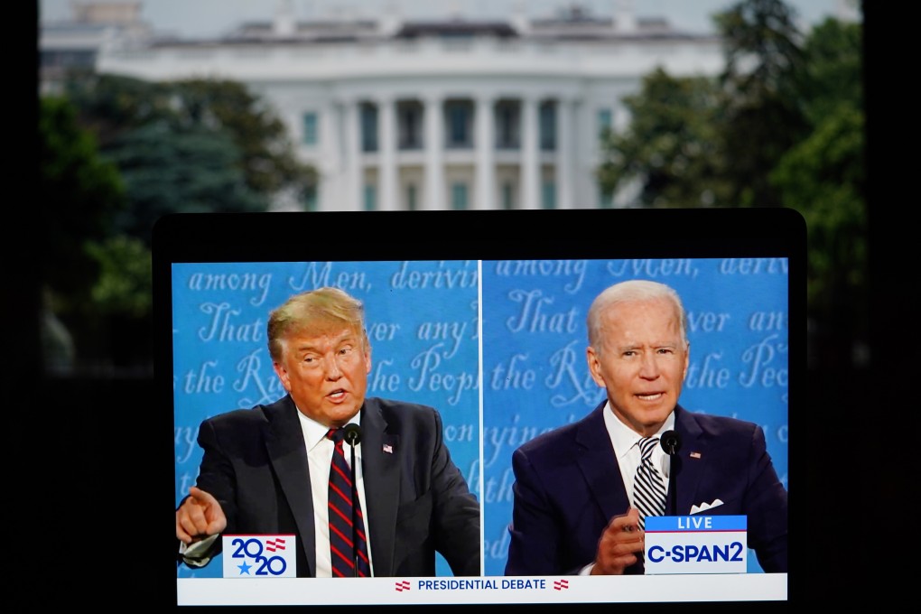 US President Donald Trump (left) and his Democratic challenger in the presidential election Joe Biden are seen on a computer screen, during their first debate on September 29. Photo: Xinhua