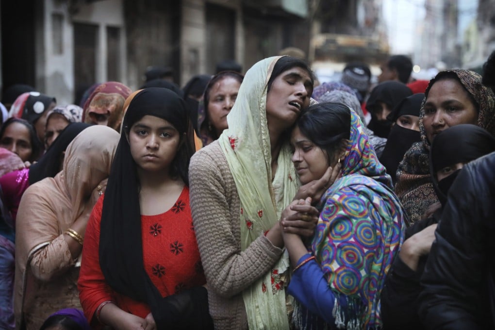 Relatives and neighbours mourn the death of Mohammad Mudasir, 31, killed in communal violence in New Delhi on February 27. India’s minority Muslim community increasingly feel disempowered and isolated. Photo: AP