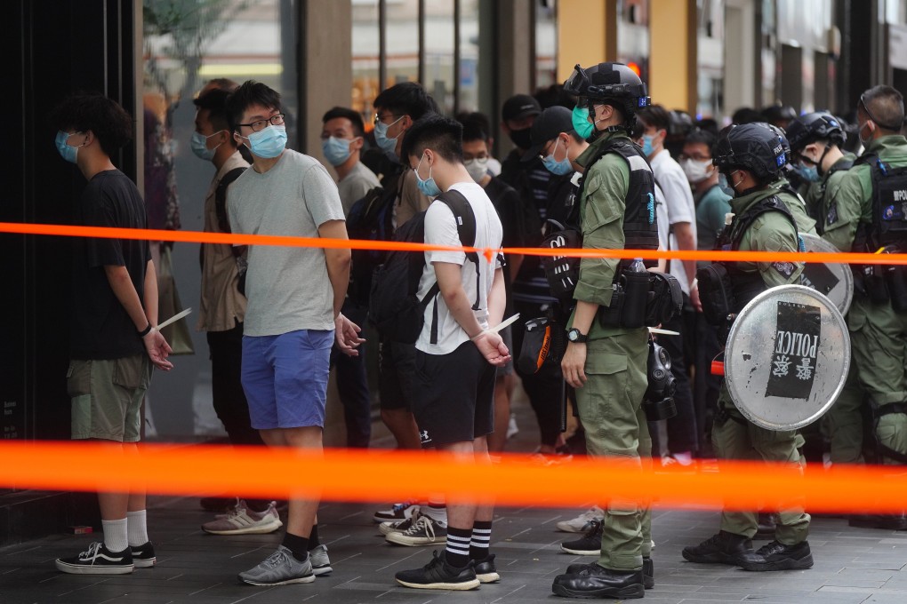 Anti-government protestors arrested with plastic cuffs in Causeway Bay on National Day. Photo: Sam Tsang