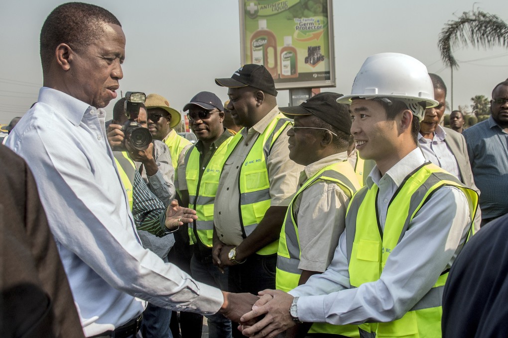 Zambian President Edgar Lungu meets workers from Aviation Industry Corp of China in 2018. Photo: AFP