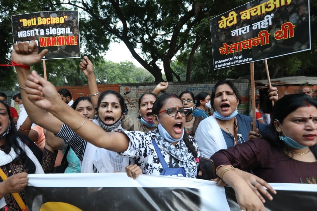 Indian activists from various organisations hold placards during a protest against an alleged gang rape of a 19-year-old Dalit girl in Uttar Pradesh. Photo: EPA