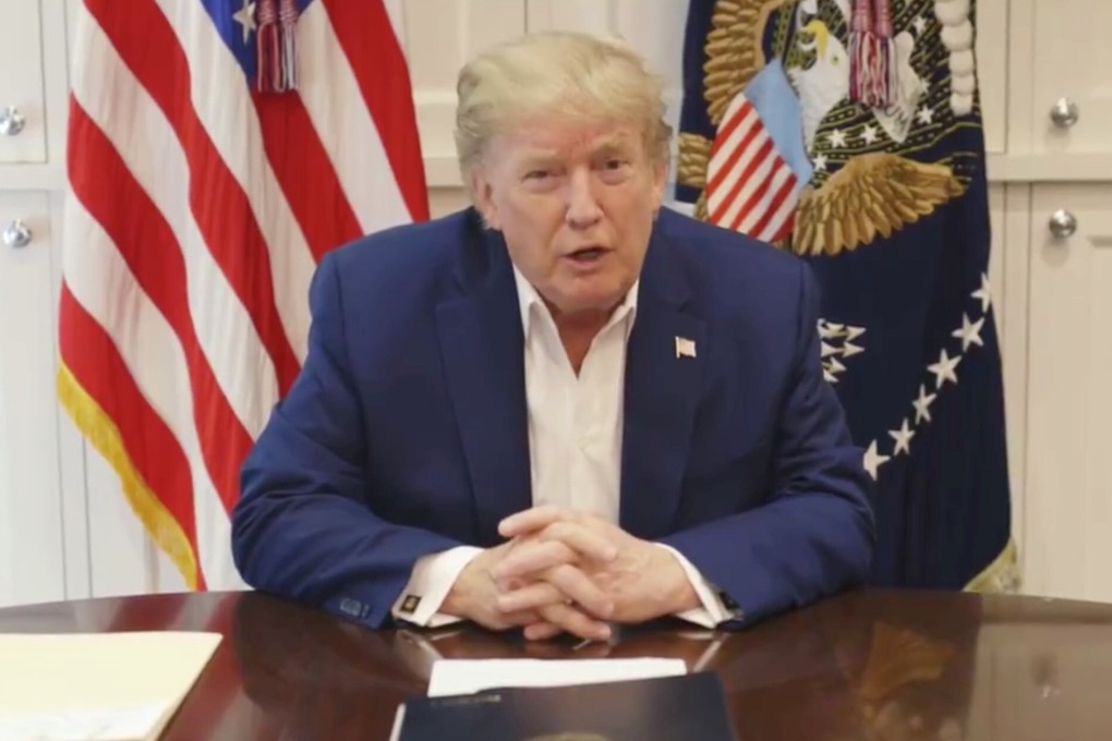 US President Donald Trump, who is being treated for Covid-19 in a military hospital outside Washington, speaks from his hospital room. Photo: Reuters