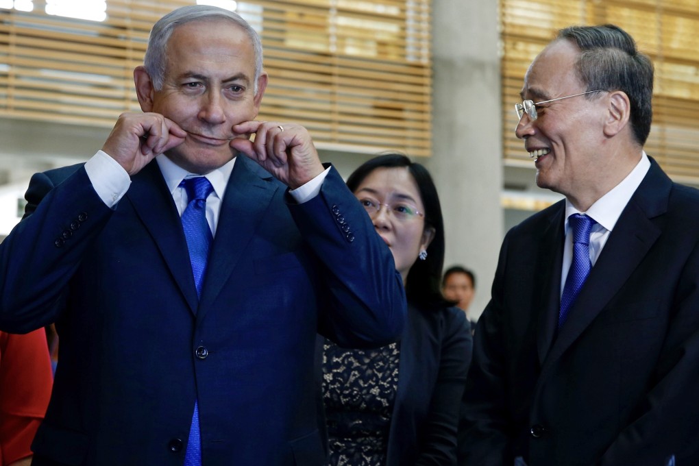 Israeli Prime Minister Benjamin Netanyahu makes a face during a tour of the Israeli Innovation Summit in Jerusalem with Chinese Vice President Wang Qishan in 2018. Photo: AFP