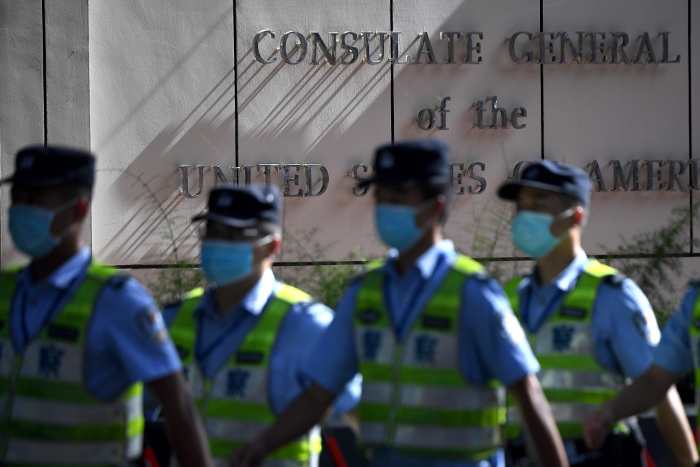 Police officers in front of the US consulate in Chengdu which was ordered to shut after the forced closure of Beijing's consulate in Houston. Photo: AFP