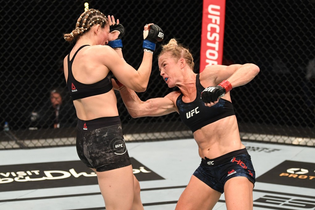 Holly Holm punches Irene Aldana in their women’s bantamweight bout during the UFC Fight Night event inside Flash Forum on UFC Fight Island on October 04, 2020 in Abu Dhabi, United Arab Emirates. Photos: Josh Hedges/Zuffa LLC