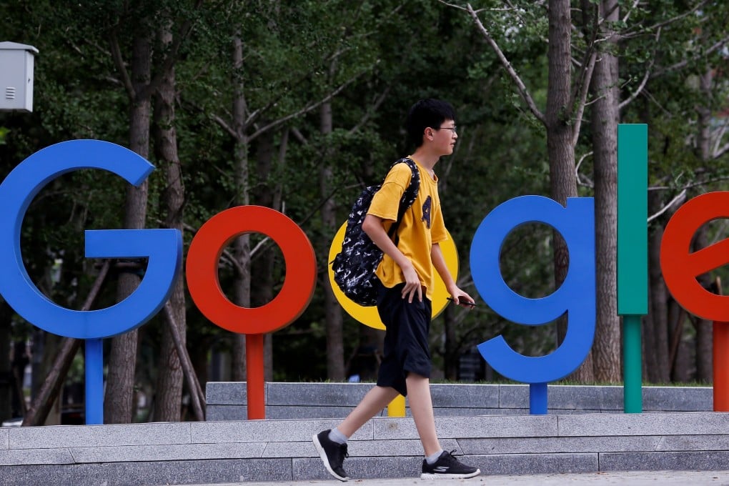 A man walks past Google’s office in Beijing on August 8, 2018. Photo: Reuters