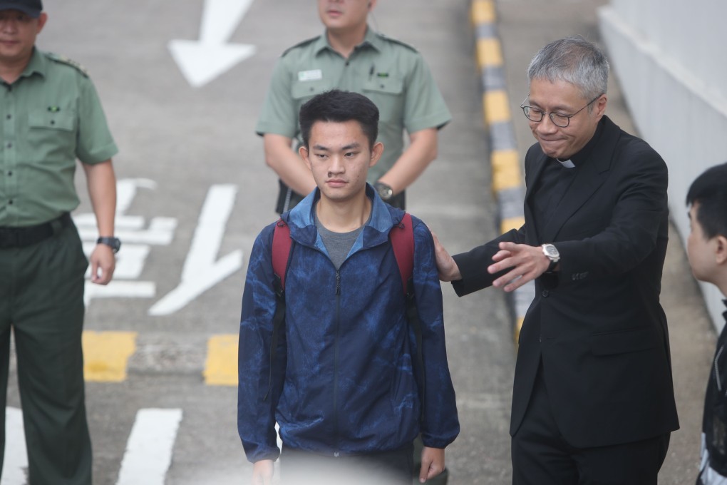 Murder suspect Chan Tong-kai (left) with Reverend Peter Koon Ho-ming after being released a year ago. Photo: Winson Wong