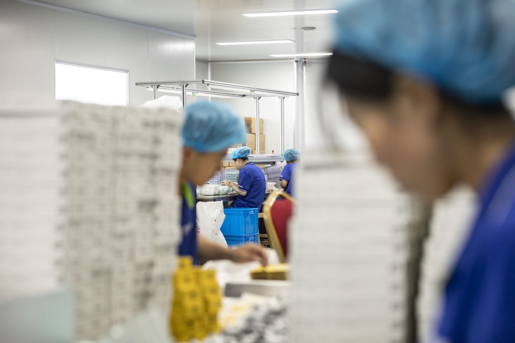 Employees work on a production line at the Yangzhou Shuguang Toothbrush Factory in Yangzhou, Jiangsu province, China, on September 21. As export orders started plummeting in March amid the coronavirus’ global spread, the Chinese toothbrush maker turned to the domestic market. With the help of Alibaba Group’s huge trove of data on what Chinese consumers are searching for, the company shifted to making products that became local hits. Photo: Bloomberg