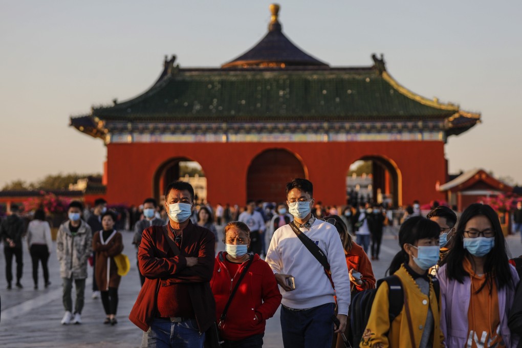 Tourists visit the Temple of Heaven during the ‘Golden Week’ public holidays, in Beijing, China. Photo: EPA-EFE