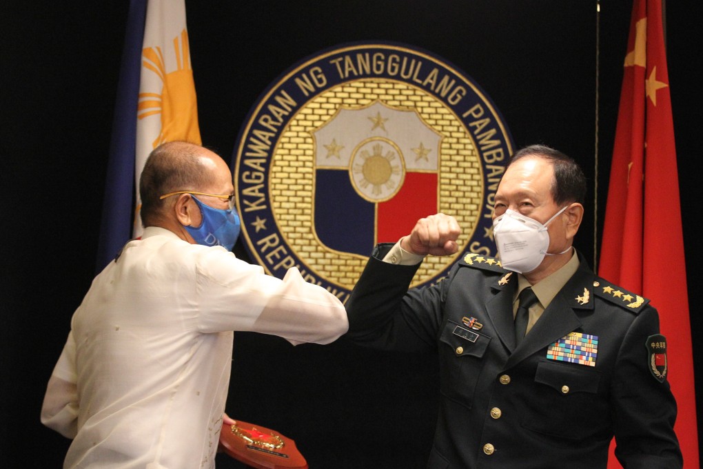 As part of its Southeast Asia diplomatic blitz, Chinese Defence Minister Wei Fenghe, right, met Philippine Defence Secretary Delfin Lorenzana, in Manila in September to discuss defence and military cooperation. Photo: EPA