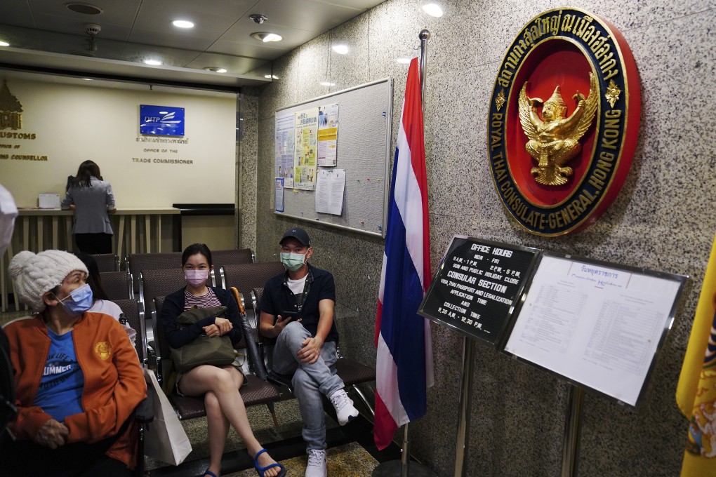 People wait at the Thai consulate in Hong Kong in Central on Tuesday. Photo: Sam Tsang