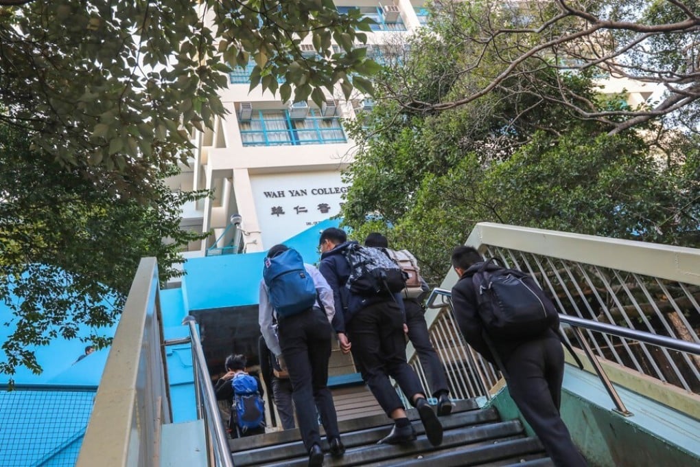 Students at the Wah Yan College Hong Kong campus in Wan Chai, where two home-made explosive devices were found yesterday evening. 10DEC19 SCMP / Felix Wong
