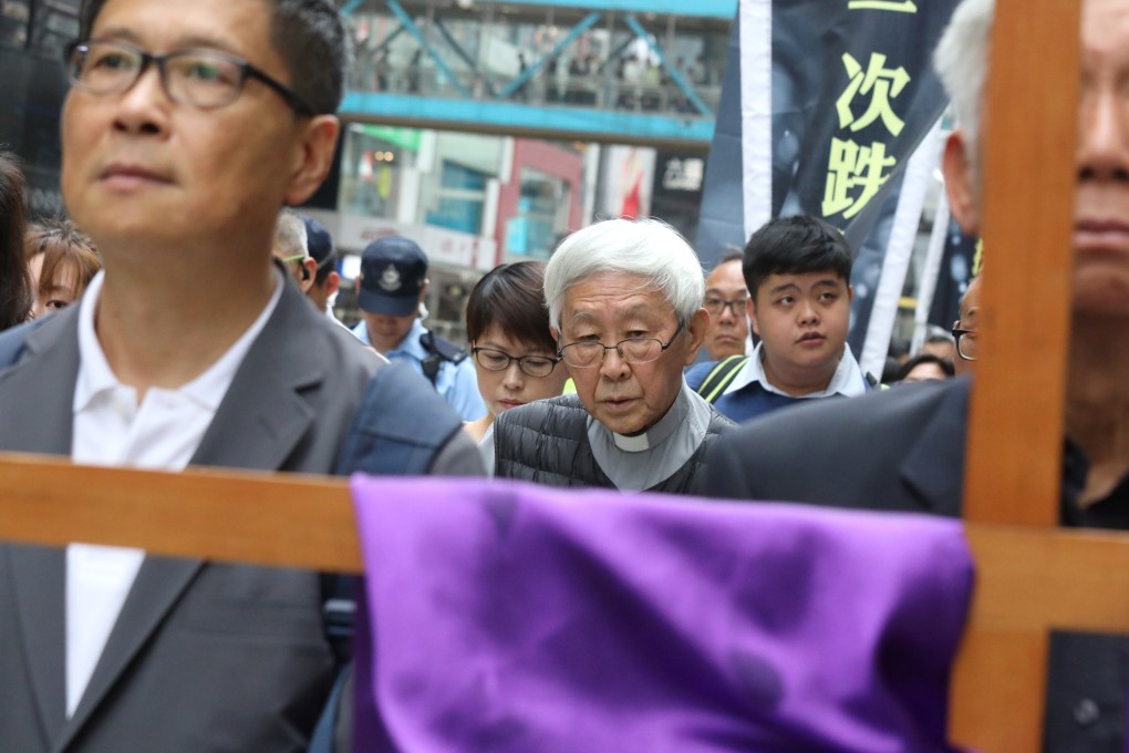 Cardinal Joseph Zen (centre) joins Christians (both Catholics and Protestants) in a protest rally from Causeway Bay to the central government headquarters in Admiralty, to mark the death of democracy in Hong Kong on March 30, 2019. Photo: Dickson Lee
