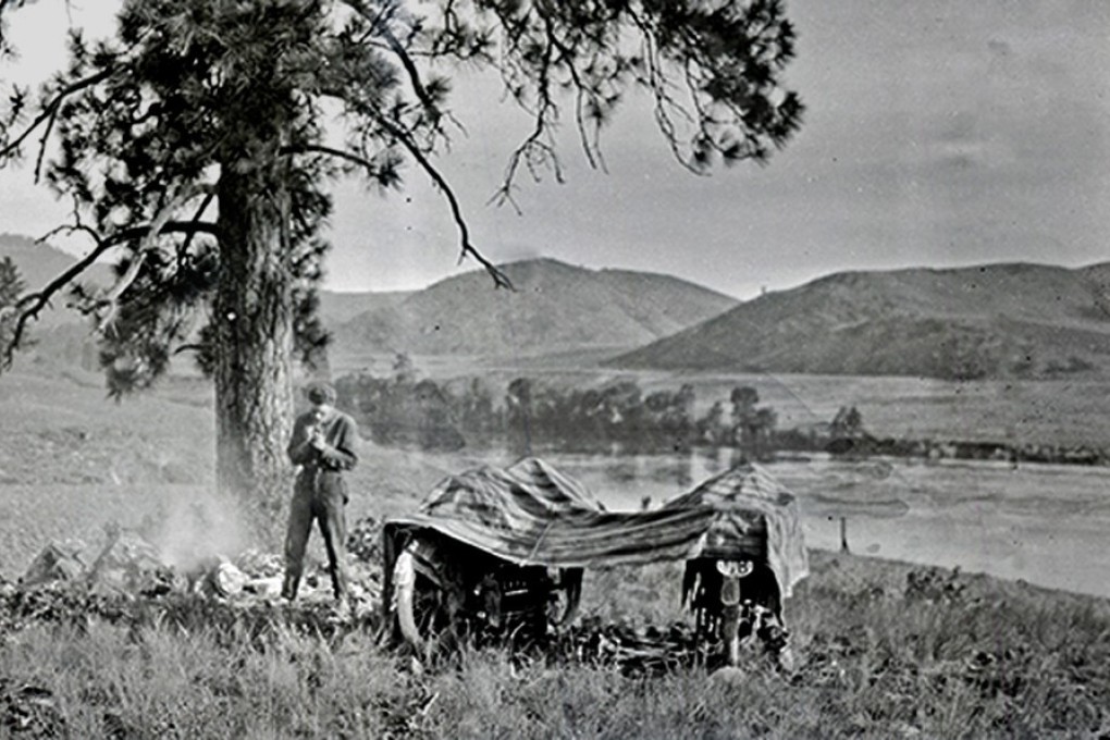 Carl Stearns Clancy taking a break by the Clark Fork River in Montana, in the US, in 1913, on his round-the-world journey. Photo: The Clancy Family Collection