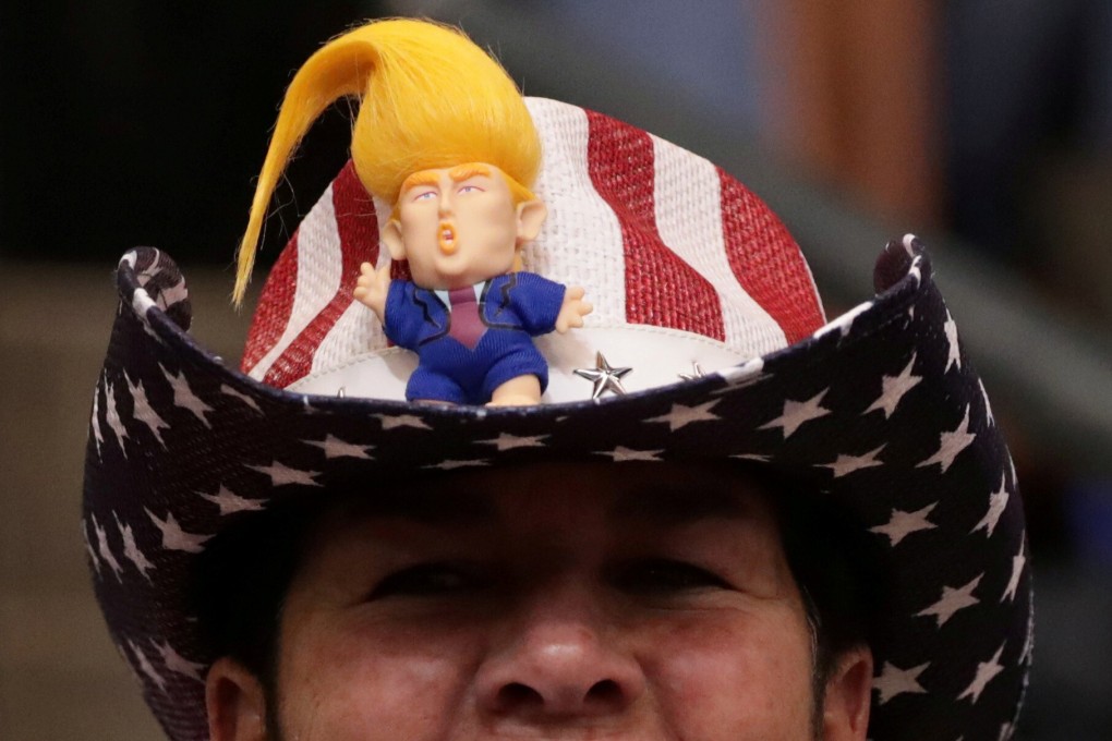 A Trump supporter at a rally in New Hampshire in February. Pro-democracy Hongkongers profess to support Trump despite his attacks on American democracy and refusal to condemn white supremacists. Photo: Reuters