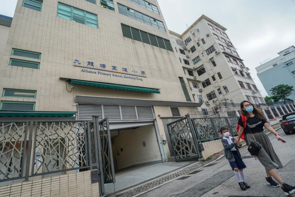 A student and his mother at Alliance Primary School in Kowloon Tong. Photo: Felix Wong