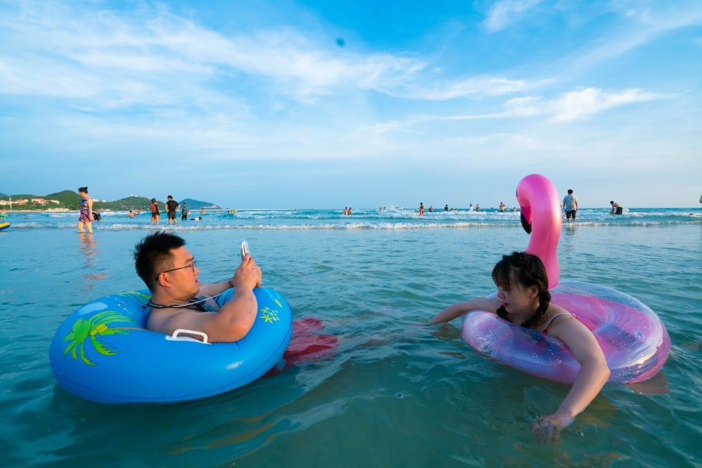 Domestic tourists in Dadonghai, Hainan. Photo: Steven Ribet