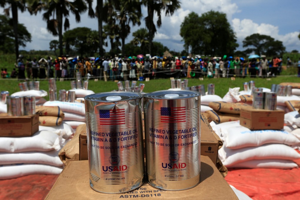 Refugees from South Sudan wait to receive food from the World Food Programme in Palorinya settlement in Moyo district, northern Uganda. Photo: Reuters