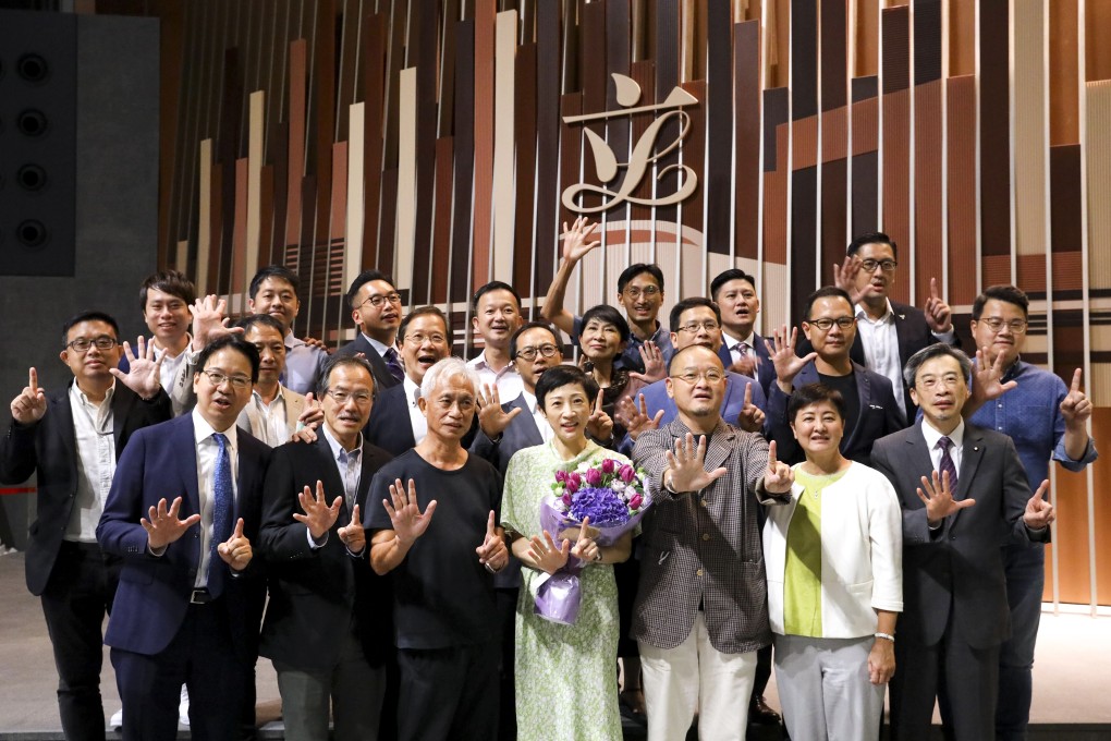 Opposition Legco members pose for a separate group photograph after the last session ended on July 17. In a sign of the deep rift, lawmakers refused to stand together for the traditional end-of-term photo. Photo: Dickson Lee