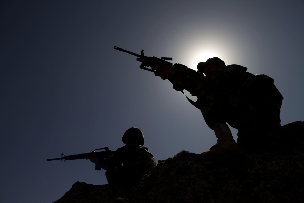 Afghan soldiers take part in a clean-up operation against Taliban militants in eastern Laghman province, Afghanistan, on Monday. Photo: Xinhua