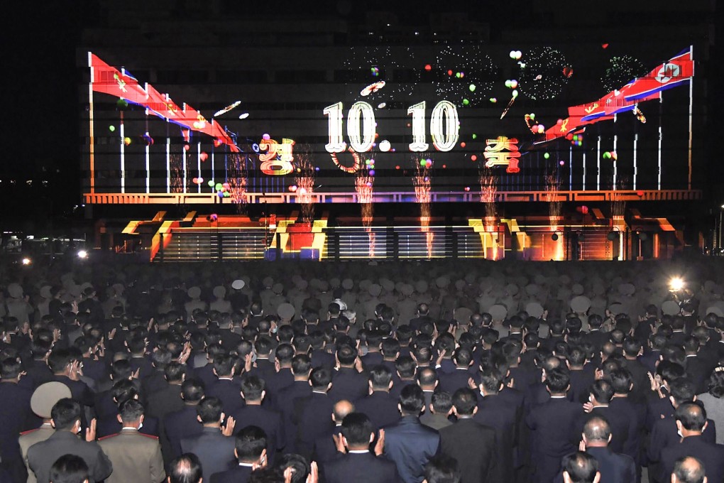 North Koreans enjoying a lighting festival to mark the 75th anniversary of Workers’ Party of Korea in Pyongyang. Photo: AFP